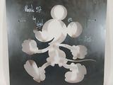 mickey mouse drawing on a blackboard with white writing on it