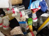 a pile of assorted items in a trash can