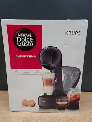emballage d'une cafetière posée sur une table en bois