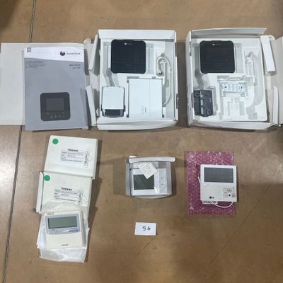 several electronic devices are sitting in a box on a table