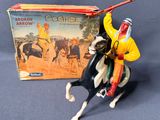 figurine représentant un homme à cheval, une lance à la main
