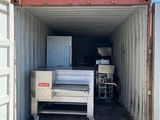 a large container with a bed inside of it