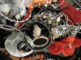 a pile of jewelry that is sitting on a table