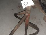 a metal stand with a number on it in a room
