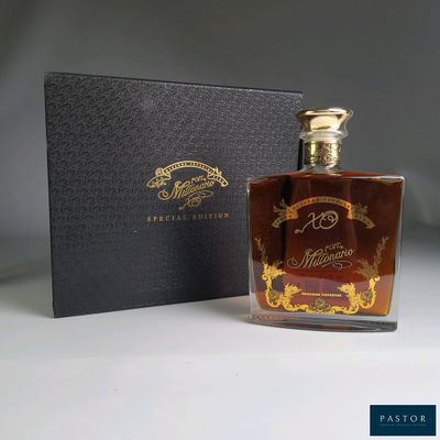 an image of a bottle of liquor in front of a box