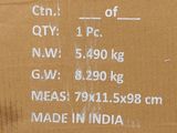 a cardboard box with a price label on it