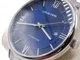 a close up of a wrist watch on a display stand