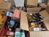 many boxes of wine and other items on the floor