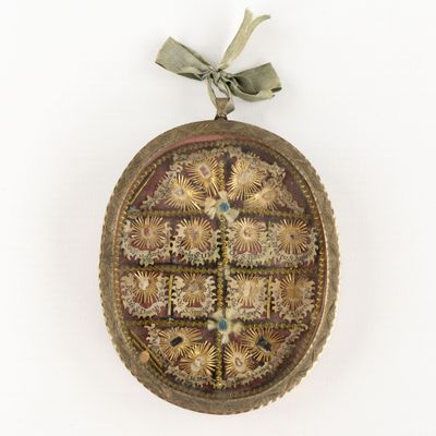 an image of a decorative ornament hanging on a wall