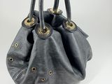 leather handbag on a white background with a white background