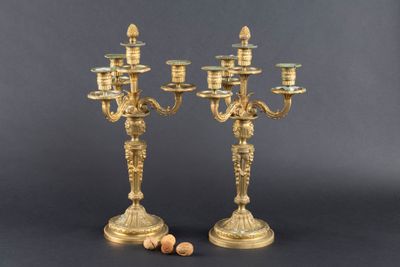 pair of antique brass candelabs with candlesticks and corks