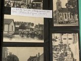 une vieille photo en noir et blanc représentant un livre avec des illustrations d'une église