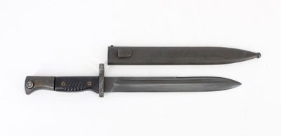 pair of knives on a white surface with a white background