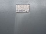 a sign on the side of a metal box