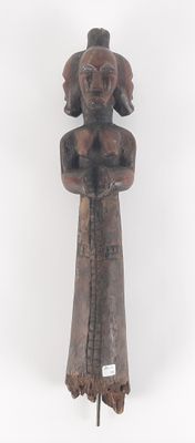 a close up of a statue of a woman with a hat on her head