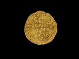 une pièce d'or portant l'image d'un homme et d'une femme