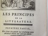 an old book with a black and white image of a man and a woman sitting on a bench