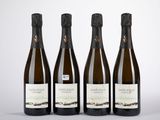 trois bouteilles de vin posées l'une à côté de l'autre sur une table