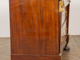 an image of a wooden cabinet with a marble top