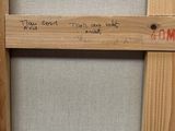 a picture of a wooden frame with writing on it