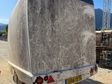 a truck that is parked on the side of the road