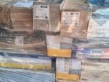 many boxes stacked on top of each other on a pallet
