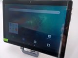 someone is holding a tablet with a screen on top of it