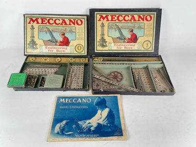 two boxes of meccano and a box of meccano