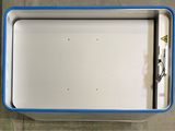 a white box with a blue lid sitting on the floor