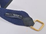 navy blue woven belt with gold buckle on white background