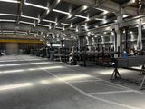 a large room with a lot of machines in it