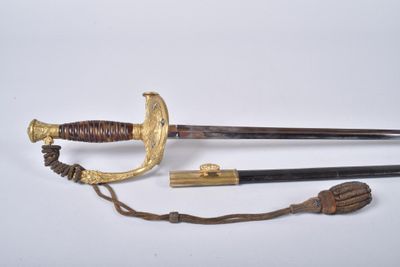 an image of a sword with a wooden handle and a brass handle