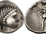 a silver coin with a woman and a man on it