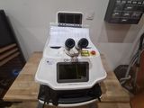 a machine that is sitting on top of a wooden table