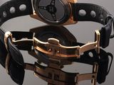 a watch that is sitting on top of a table