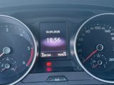 a close up of the dashboard of a car with the time displayed