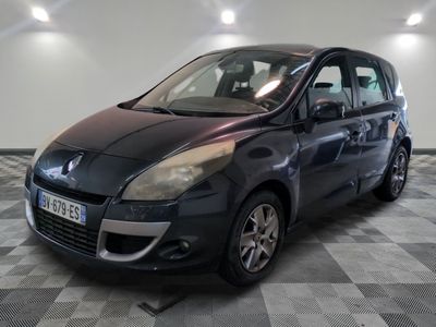 a picture of a black car parked in a garage