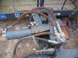 a machine that is sitting on the ground in the dirt