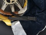 a helmet that is sitting on top of a bag