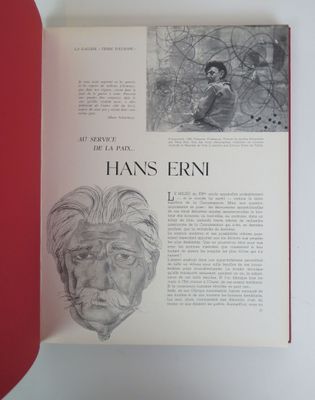 an open book with a drawing of a man ' s face on it