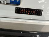 a sticker that says vauto on the back of a car