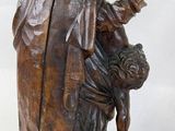 statue of a woman holding a child in her arms