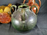 three vases sitting next to each other on a table