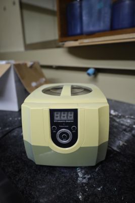 a small blender sitting on a counter in a kitchen