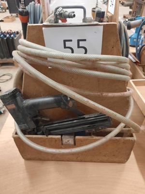 a box with a bunch of tools in it on a table