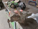 a workbench with tools on it in a garage