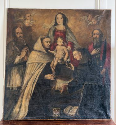 an old painting of a family with a baby in a room