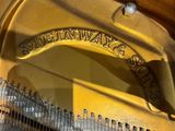 an image of a close up of a piano in a room