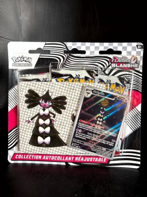 a box of pokemon trading cards on a table