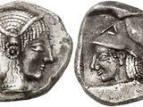 une pièce d'argent sur laquelle figurent une femme et un homme